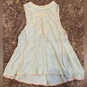 super cute tank top blue open back top